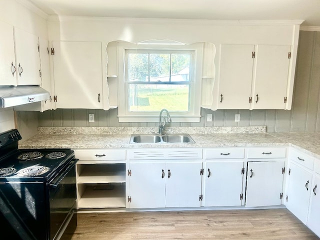 kitchen featuring exhaust hood, sink, electric range, white cabinets, and light hardwood / wood-style floors