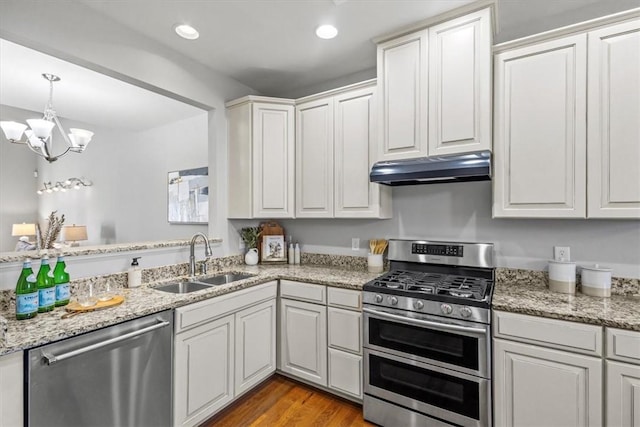 kitchen with sink, white cabinets, and stainless steel appliances