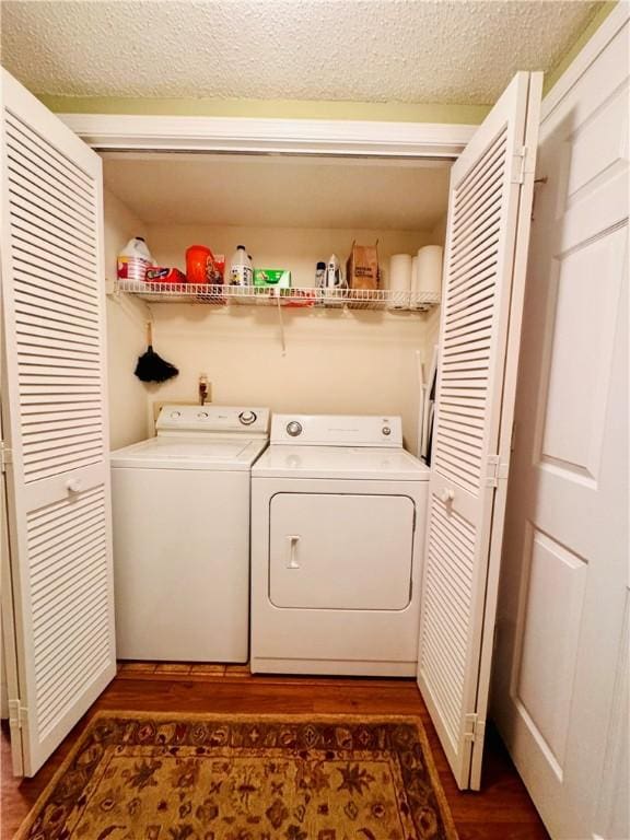811 Northlake Dr, Anderson, SC 29625 - laundry room featuring independent washer and dryer, a textured ceiling, and dark wood-type flooring