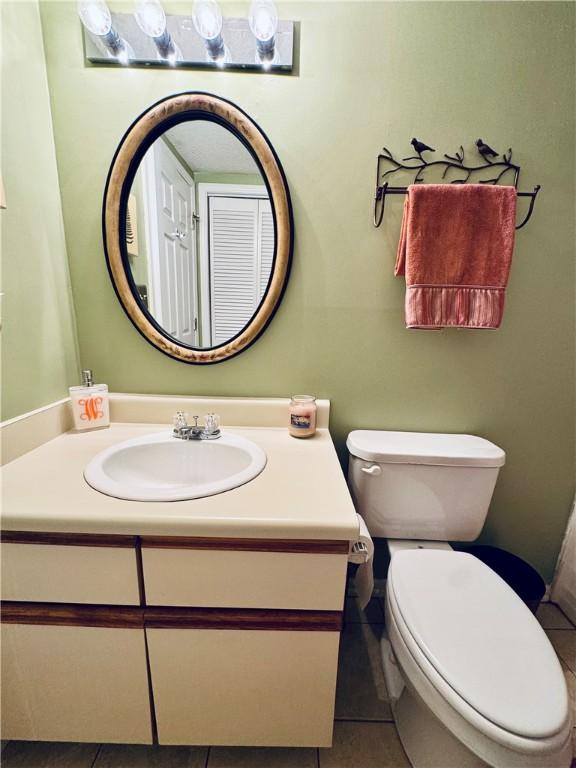 811 Northlake Dr, Anderson, SC 29625 - bathroom with vanity, toilet, and tile patterned flooring
