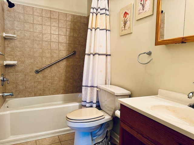 full bathroom featuring vanity, shower / bath combo with shower curtain, toilet, and tile patterned floors