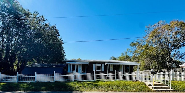 single story home featuring covered porch