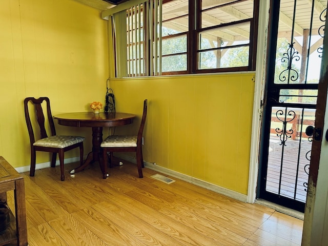 dining area with light hardwood / wood-style flooring