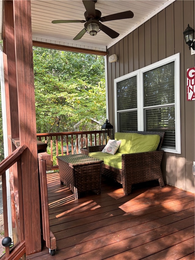 wooden deck with ceiling fan