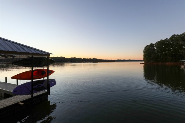 dock area featuring a water view