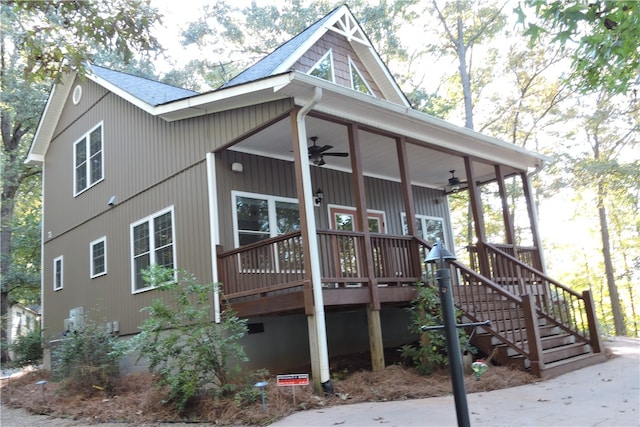 view of home's exterior featuring covered porch and ceiling fan