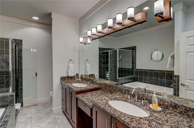 full bathroom with vanity, toilet, separate shower and tub, and tile patterned flooring