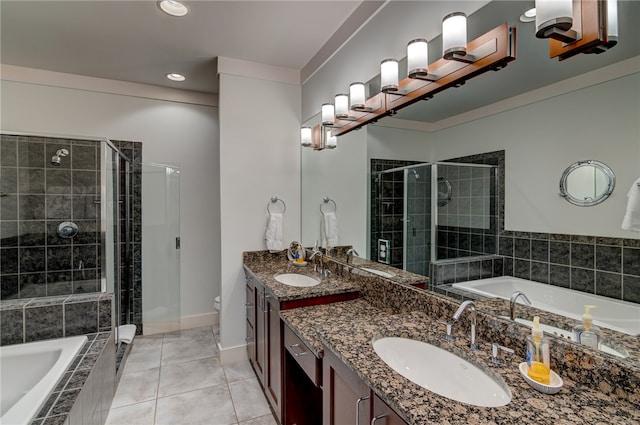 full bathroom with vanity, toilet, independent shower and bath, and tile patterned flooring