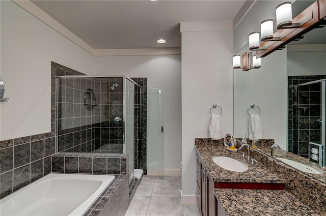 bathroom featuring vanity, independent shower and bath, and tile patterned flooring