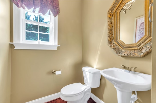 bathroom featuring toilet