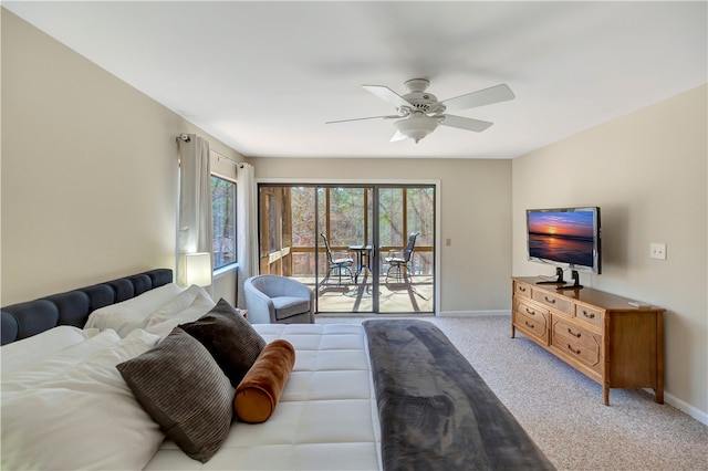 living room with light colored carpet and ceiling fan