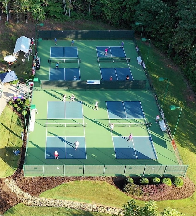 view of sport court featuring tennis court