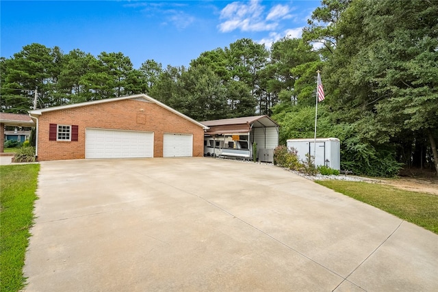 view of property exterior with a carport and a storage shed