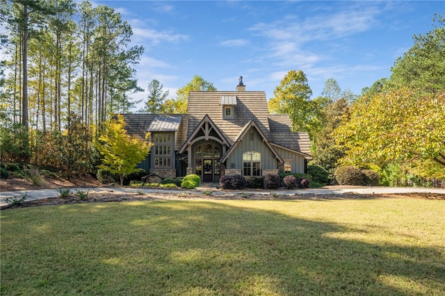 view of front of home with a front yard