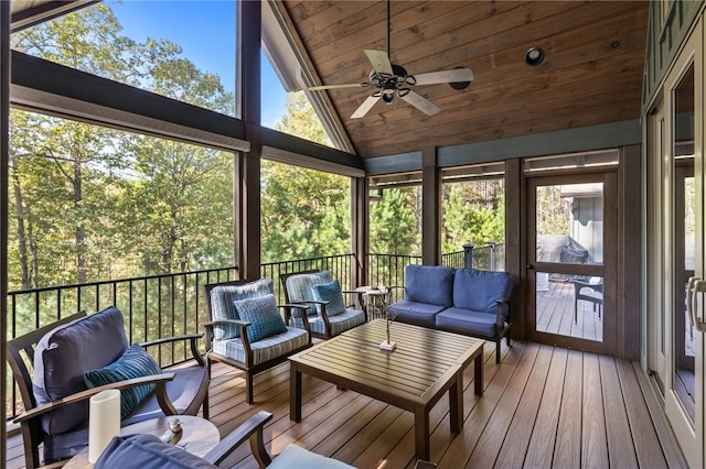 sunroom featuring ceiling fan, wooden ceiling, and vaulted ceiling