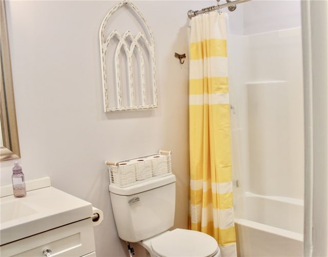 full bathroom featuring vanity, toilet, and shower / bath combo with shower curtain