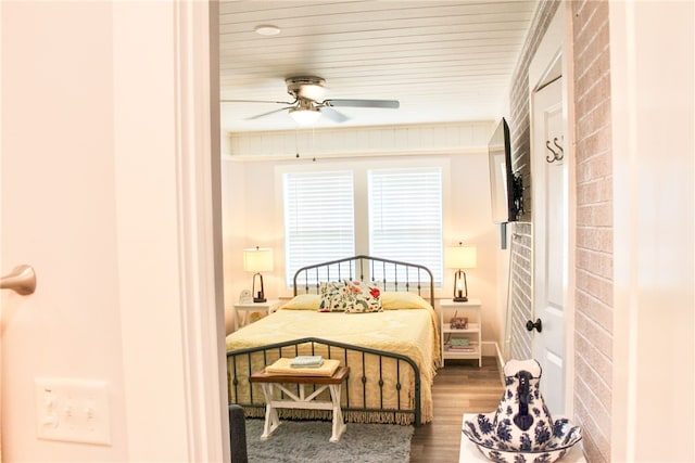 bedroom featuring wood-type flooring and ceiling fan