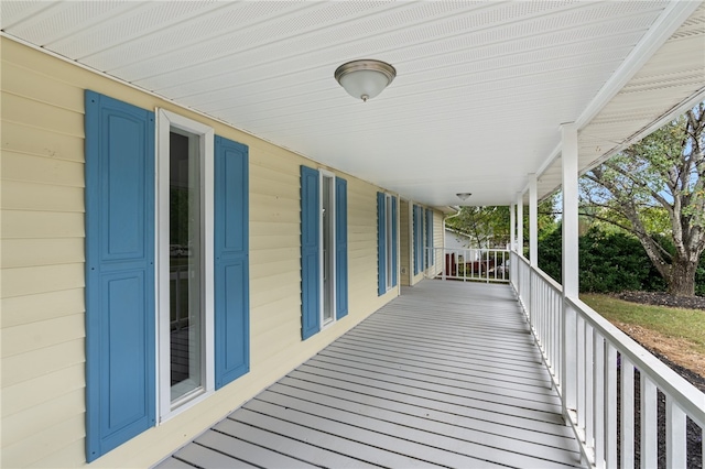 wooden terrace with covered porch