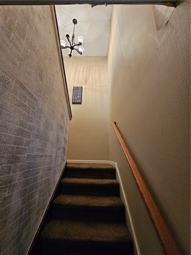 interior space featuring carpet flooring and a textured ceiling