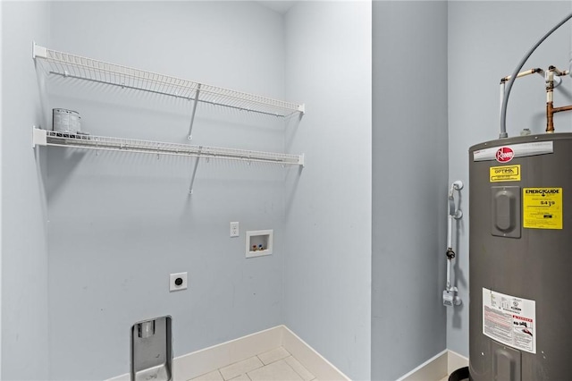 laundry room featuring laundry area, hookup for a washing machine, tile patterned floors, hookup for an electric dryer, and electric water heater