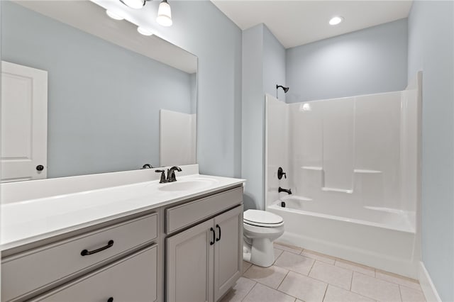 full bathroom with vanity, toilet, shower / washtub combination, and tile patterned flooring