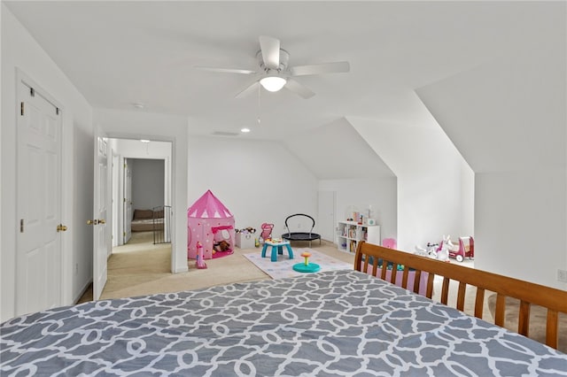 carpeted bedroom with lofted ceiling and ceiling fan