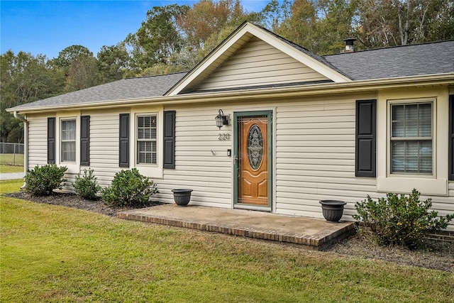 view of front of house with a front lawn