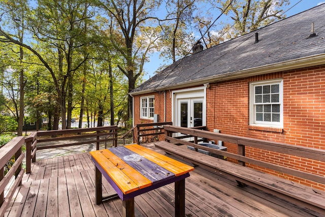 wooden terrace featuring french doors