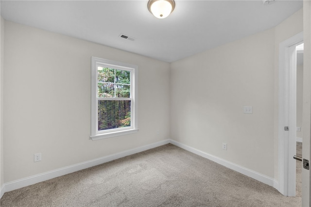 view of carpeted spare room