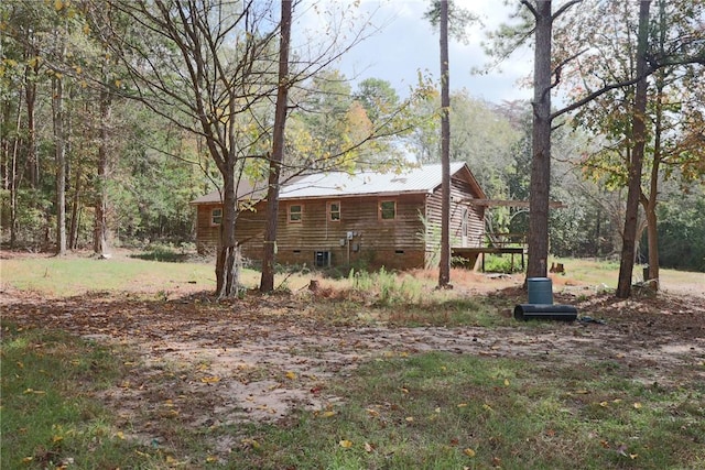 1305 Wilton E Hall Rd, Starr, SC 29684 - view of side of home featuring crawl space, a metal roof, and log siding