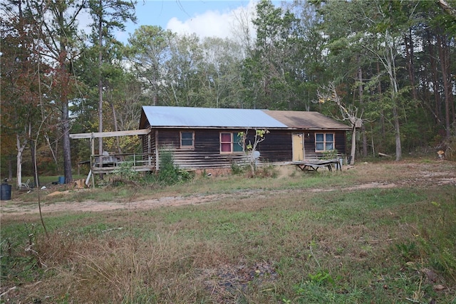 view of front facade with an attached carport