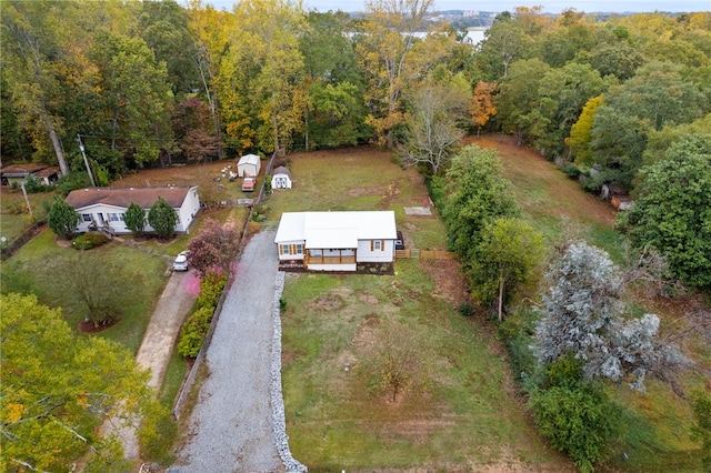 bird's eye view featuring a view of trees