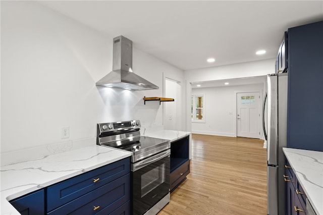 kitchen featuring ventilation hood, open shelves, blue cabinetry, stainless steel appliances, and light wood-style floors