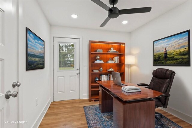 office space with recessed lighting, baseboards, light wood finished floors, and ceiling fan