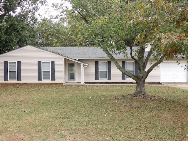 ranch-style house with a front yard and a garage