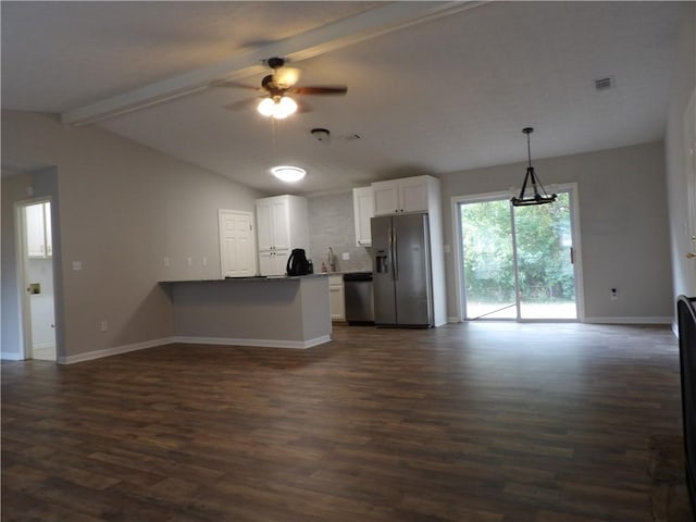 kitchen featuring stainless steel appliances, a peninsula, a ceiling fan, white cabinets, and dark wood-type flooring