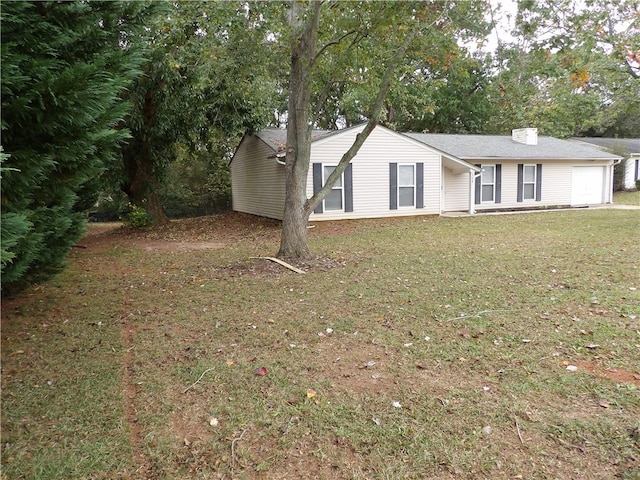 ranch-style house with a front yard