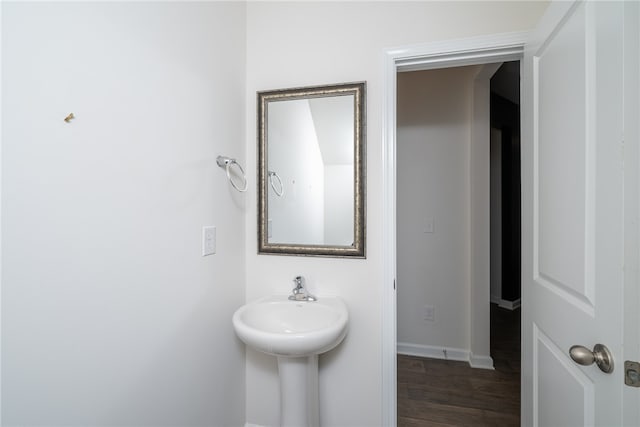 bathroom featuring wood-type flooring