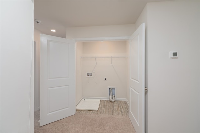 laundry room with hookup for an electric dryer, light carpet, and hookup for a washing machine