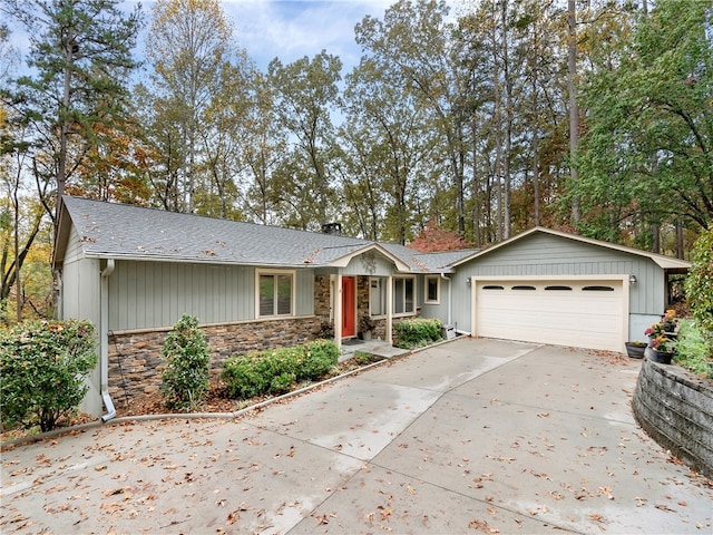 ranch-style home featuring a garage