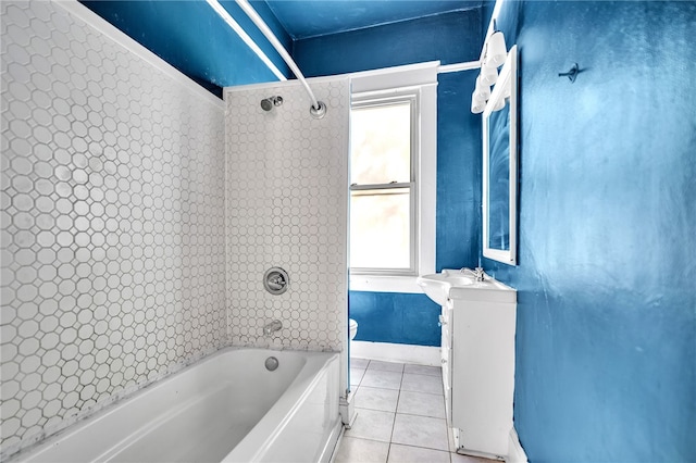 full bathroom with vanity, tile patterned flooring, toilet, and tiled shower / bath