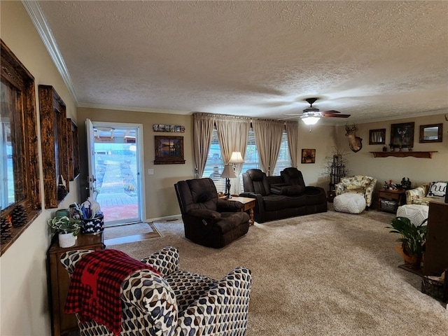 carpeted living room with ornamental molding, a wealth of natural light, a textured ceiling, and ceiling fan