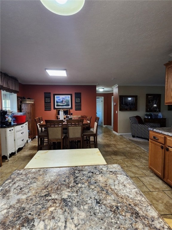 dining room with a textured ceiling