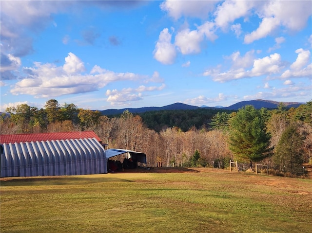 mountain view featuring a rural view