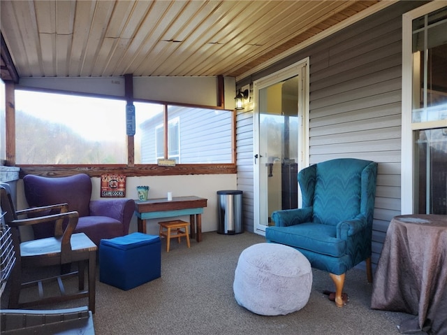 sunroom / solarium with vaulted ceiling and wood ceiling