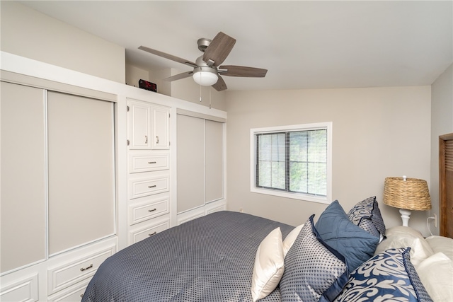 bedroom featuring lofted ceiling and ceiling fan