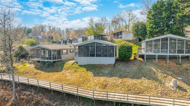 1230 Melton Rd Unit 31, West Union, SC 29696 - rear view of property with a sunroom and a residential view