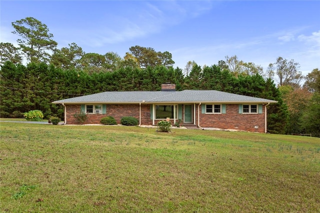 ranch-style home with a front yard