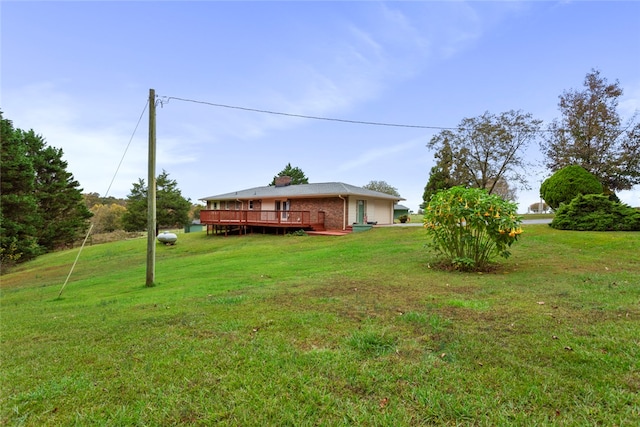 view of yard featuring a deck