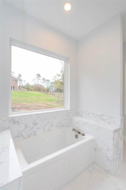 101 Tall Ship Dr, Anderson, SC 29625 - bathroom featuring a garden tub, recessed lighting, marble finish floor, and wainscoting